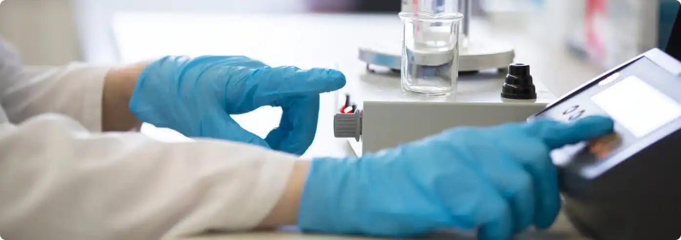 medical professional using medical instrument for measurements